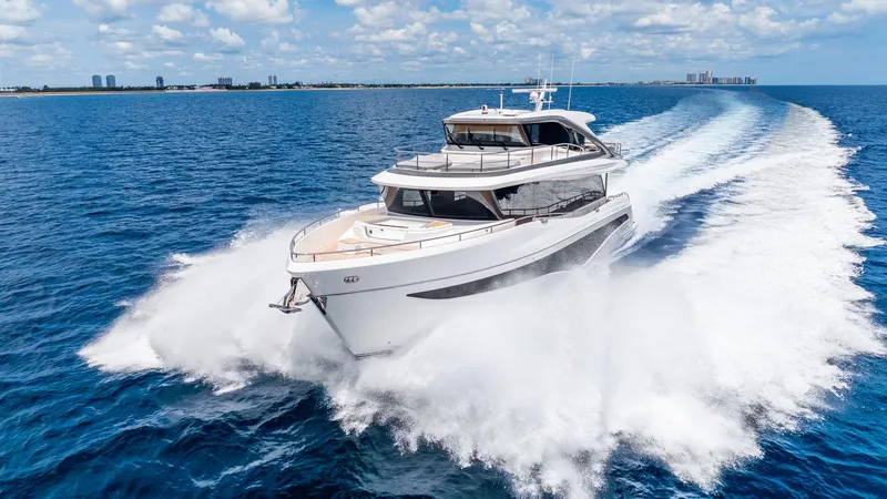 Slide: The Image of Luxurious 2024 Princess X80 yacht cruising on open sea under clear skies. - 8