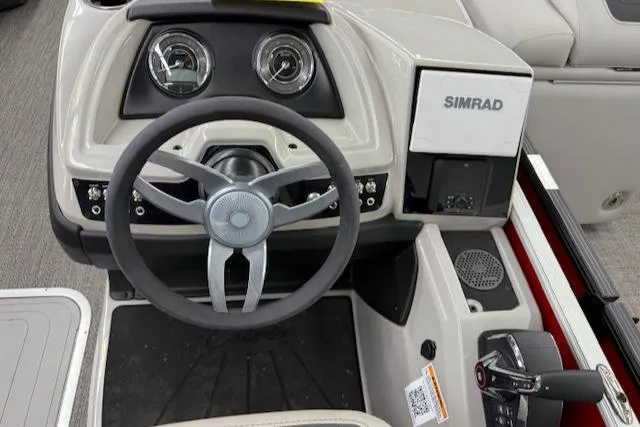 Slide: The Image of 2025 Barletta Cabrio 22QC dashboard with steering wheel and Simrad display. - 10