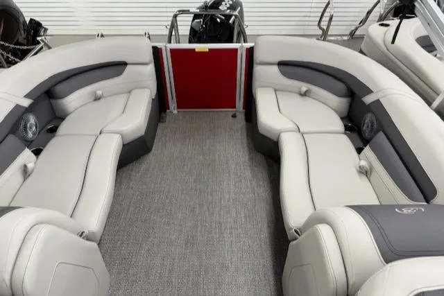Slide: The Image of 2025 Barletta Cabrio 22QC pontoon boat interior with plush seating and modern design. - 13