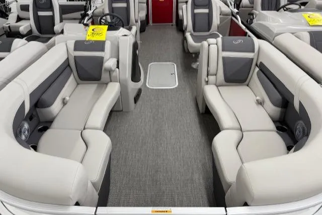 Slide: The Image of 2025 Barletta Cabrio 22QC pontoon boat interior with plush seating and modern design. - 6