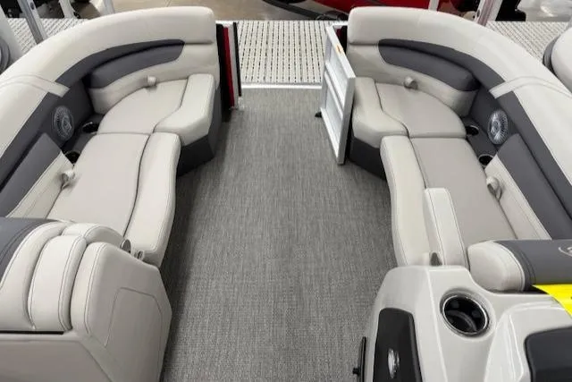 Slide: The Image of 2025 Barletta Cabrio 22QC pontoon boat interior with plush seating and modern design. - 8