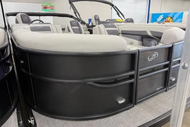 The Image of 2025 Barletta Cabrio 22QC pontoon boat with sleek black exterior and plush seating. - 0