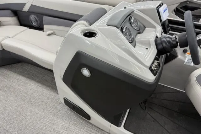 Slide: The Image of 2025 Barletta Cabrio 22QC boat interior with modern dashboard and seating. - 4