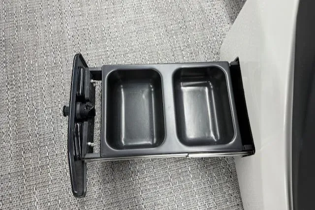 Slide: The Image of Pull-out dual cup holder in 2025 Barletta Cabrio 22QC boat. - 5