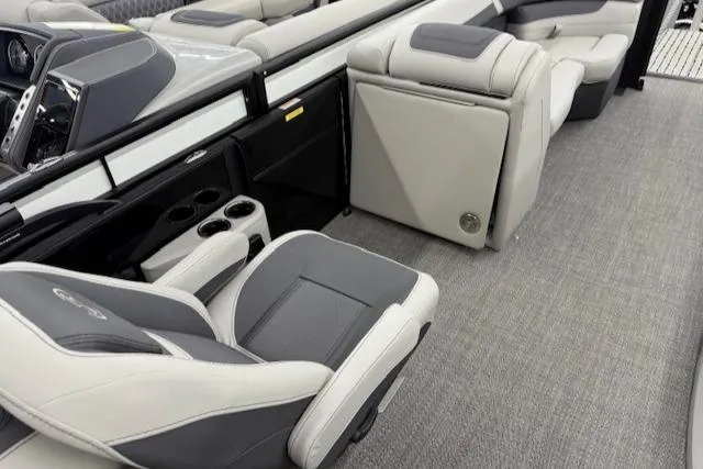 Slide: The Image of 2025 Barletta Cabrio 22QC interior with luxurious seating and cup holders. - 8