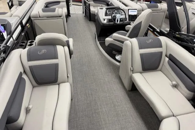 Slide: The Image of 2025 Barletta Cabrio 22QC interior with luxurious seating and modern dashboard. - 9
