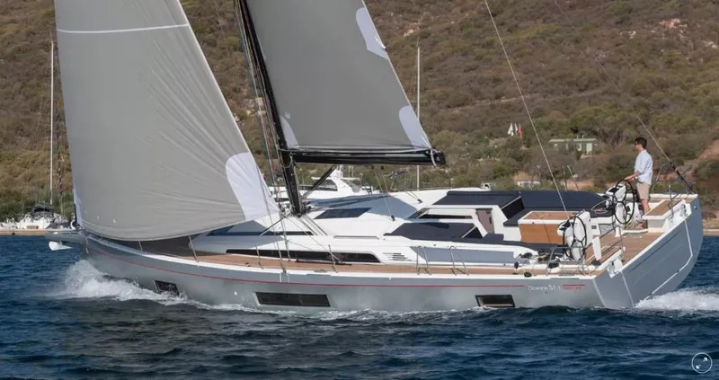 The Image of 2024 Beneteau Oceanis 51.1 sailing on water, showcasing sleek design and modern features. - 0