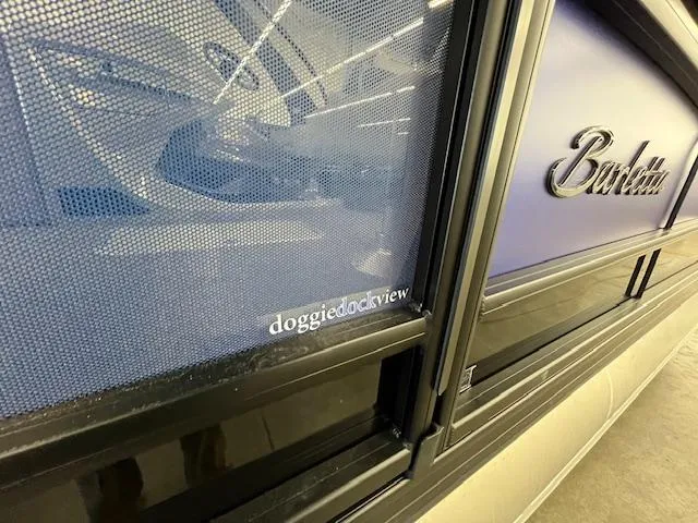 Slide: The Image of 2025 Barletta CORSA 23QC boat with "doggiedockview" feature, close-up view. - 4