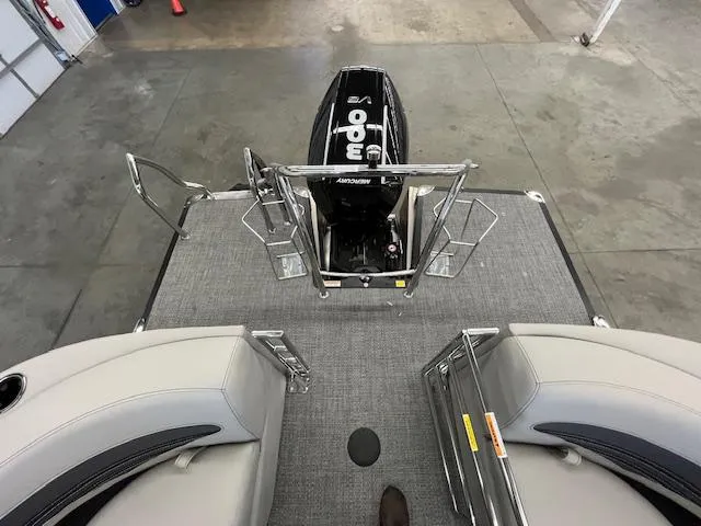 Slide: The Image of 2025 Barletta CORSA 23QC boat with powerful outboard motor and spacious seating. - 7