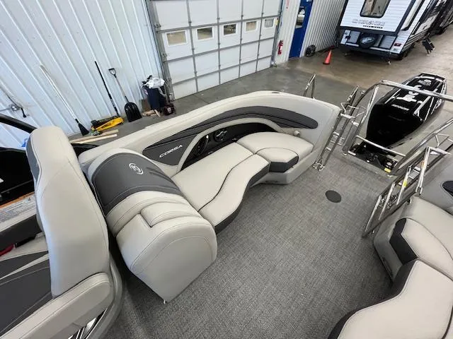 Slide: The Image of 2025 Barletta CORSA 23QC pontoon boat interior with gray seating and modern design. - 9