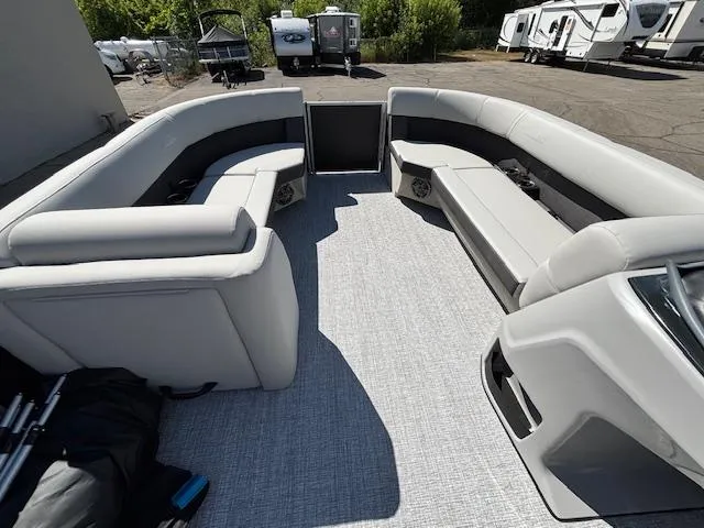 Slide: The Image of 2025 Harris Cruiser 230 pontoon boat interior with spacious seating and modern design. - 23