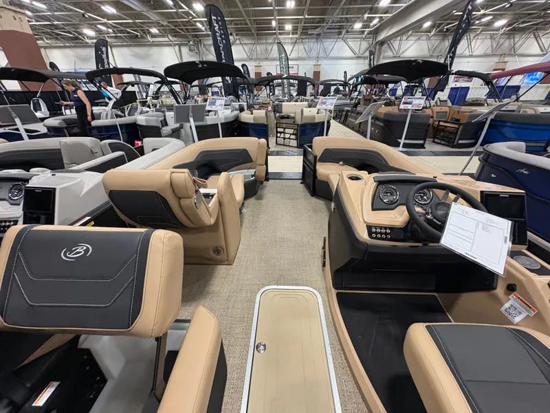 Slide: The Image of Interior of Barletta Cabrio 22 M 2026 at a boat show. - 11