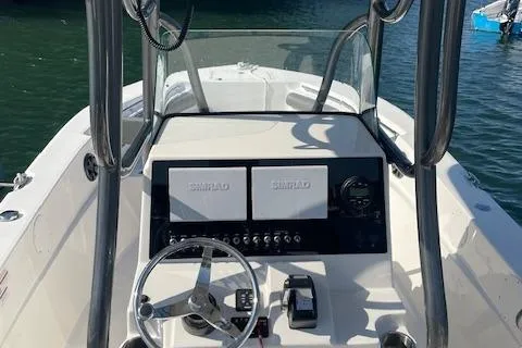 Slide: The Image of 2022 Sea Born LX24 Center Console boat with dual Simrad displays on the dashboard. - 3