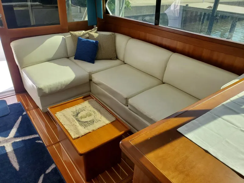 Slide: The Image of Interior of 1988 Post 46 Sportfish yacht with cozy seating and large windows. - 34