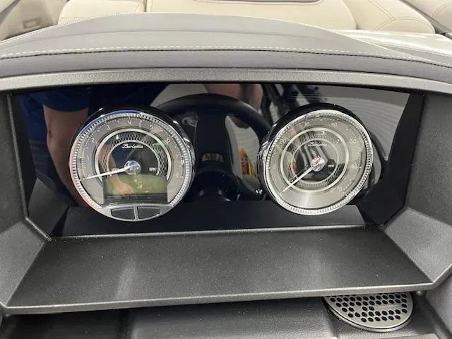 Slide: The Image of Dashboard of 2025 Barletta Lusso 25UC with analog gauges and sleek design. - 16