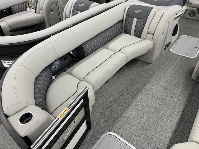 Slide: The Image of Luxurious seating in 2025 Barletta Lusso 25UC pontoon boat, featuring elegant gray upholstery. - 2