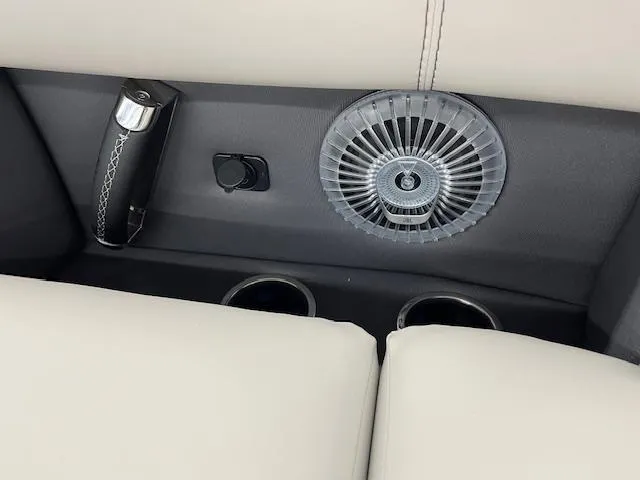 Slide: The Image of Interior of 2025 Barletta Lusso 25UC with cup holders and fan. - 25