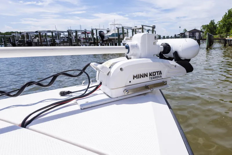 Slide: The Image of Minn Kota Terrova motor on 1999 Island Runner 31 boat, dockside view. - 21