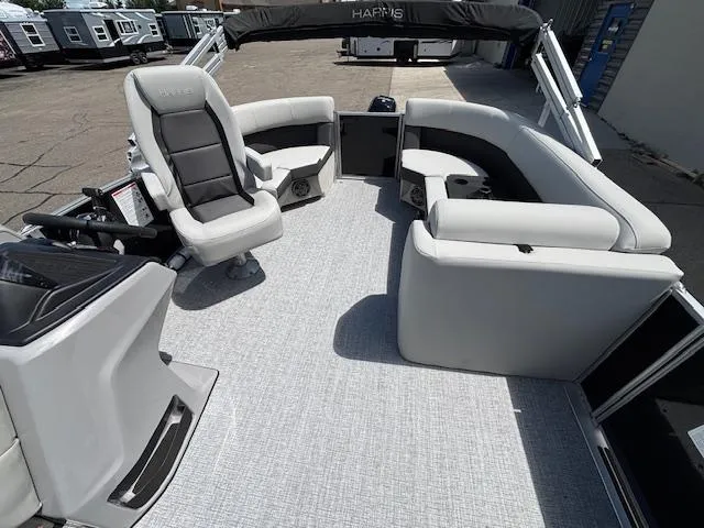 Slide: The Image of 2025 Harris Cruiser 190 pontoon boat interior with gray seating and modern design. - 16