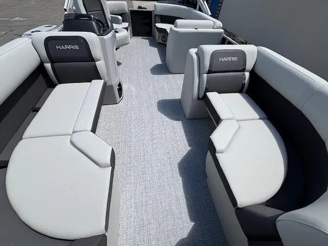 Slide: The Image of 2025 Harris Cruiser 190 boat interior with spacious seating and modern design. - 18