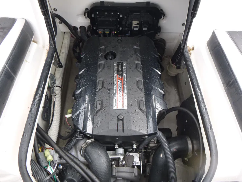 Slide: The Image of 2020 Yamaha Boats 195S engine compartment, showcasing a sleek, powerful motor design. - 11