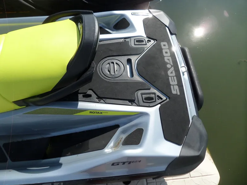 Slide: The Image of 2021 Sea-Doo GTI SE 170 jet ski with yellow seat and Rotax engine branding. - 10