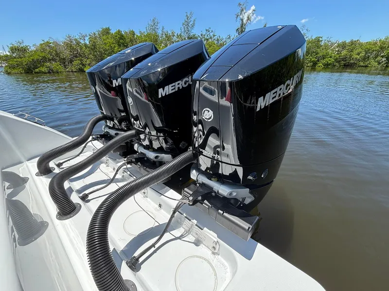 Slide: The Image of Triple Mercury outboard engines on 2026 Invincible 36 Open Fisherman boat. - 7
