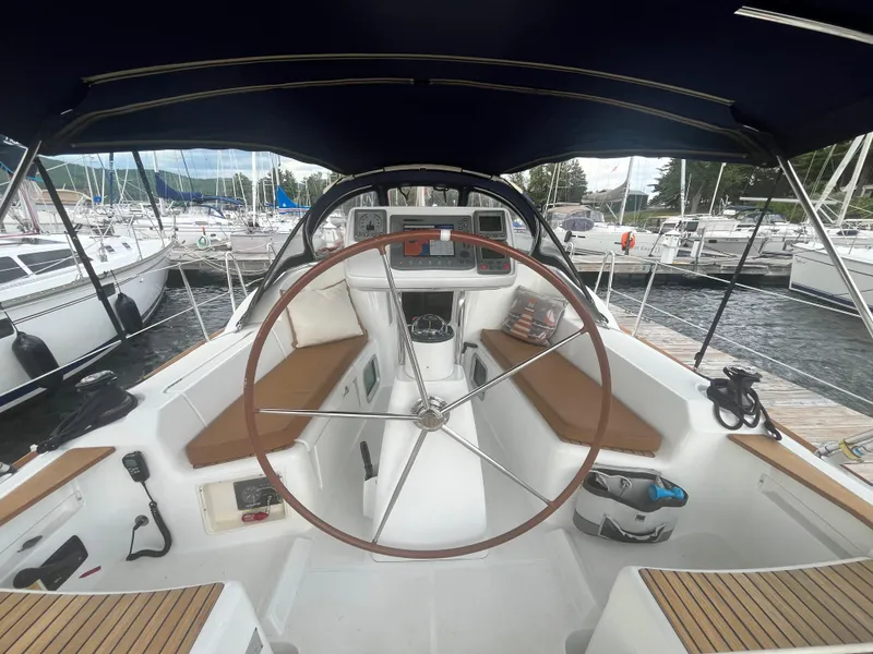 Slide: The Image of Cockpit view of 2008 Jeanneau Sun Odyssey 36i sailboat docked at marina. - 6