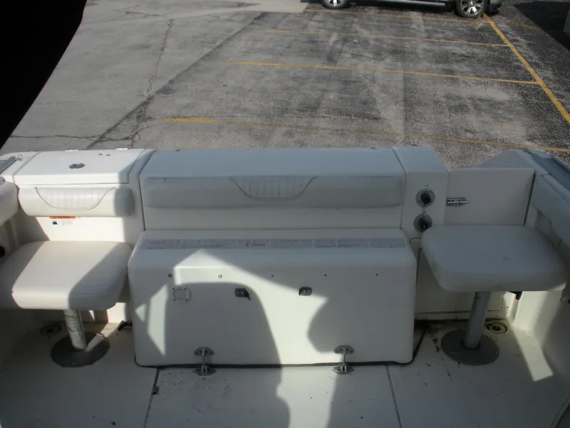 Slide: The Image of 2008 Seaswirl Striper 2101 Alaskan boat interior with seating and storage compartments. - 11