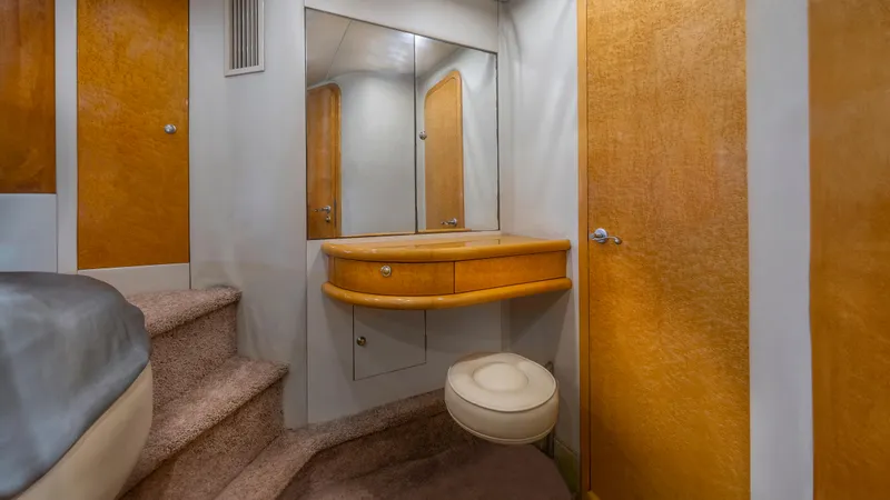 Slide: The Image of Interior of 1999 Sunseeker Predator 58 yacht with vanity and seating area. - 14