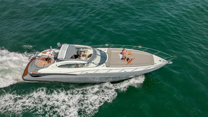 Slide: The Image of Sunseeker Predator 58 yacht cruising on open water, 1999 model. - 41
