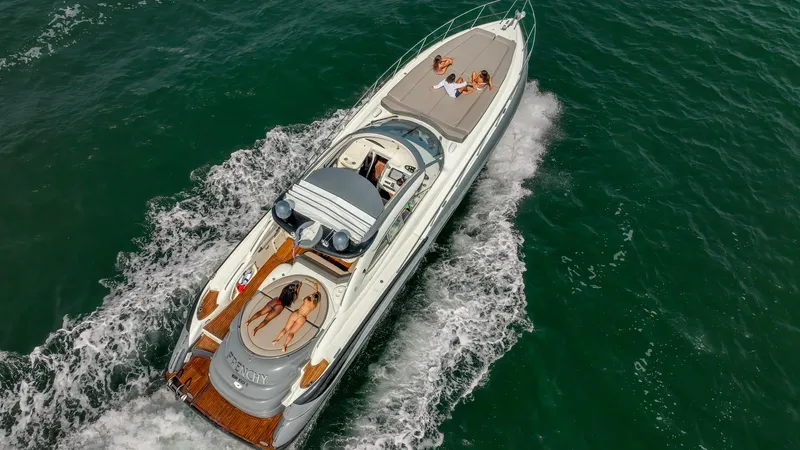 Slide: The Image of Sunseeker Predator 58 yacht cruising with passengers, 1999 model, aerial view. - 6