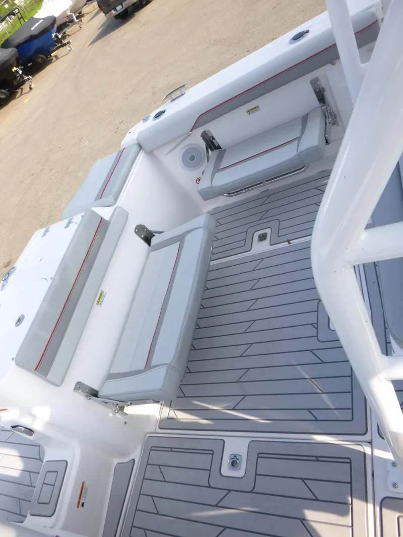 Slide: The Image of 2025 Solara S-250 CW boat interior with gray seating and deck. - 11