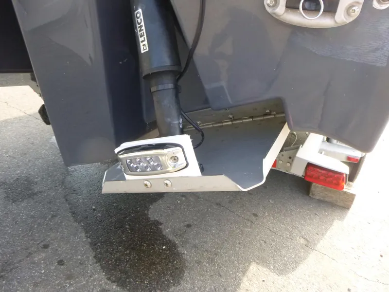 Slide: The Image of Rear view of Solara S-250 CW boat with Lenco trim tab and LED light. - 20