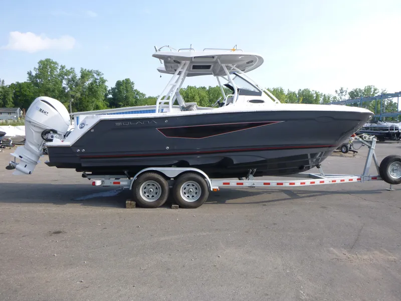 Slide: The Image of 2025 Solara S-250 CW boat on trailer, parked outdoors. - 5