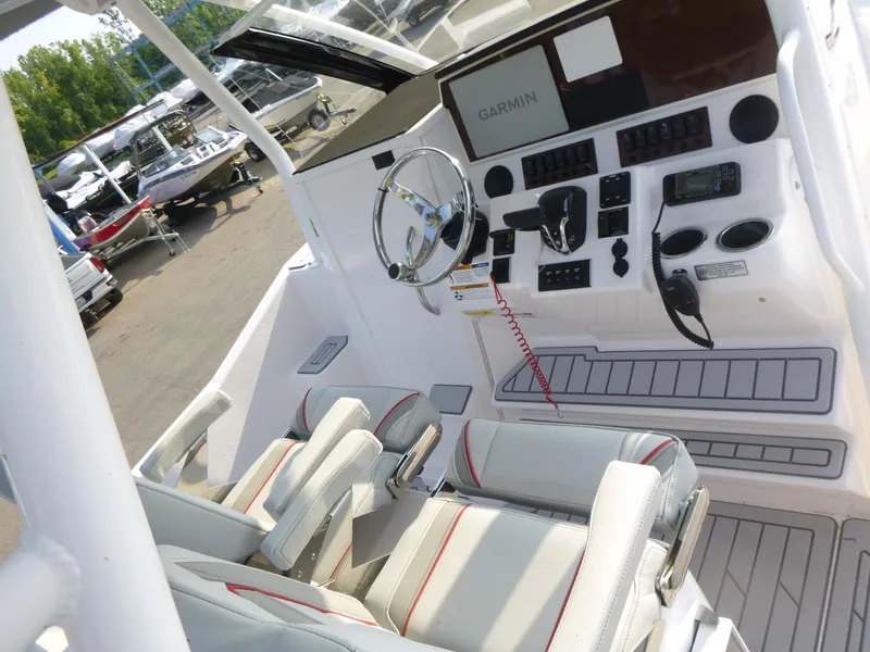 Slide: The Image of Interior of 2025 Solara S-250 CW boat with advanced navigation controls and seating. - 7