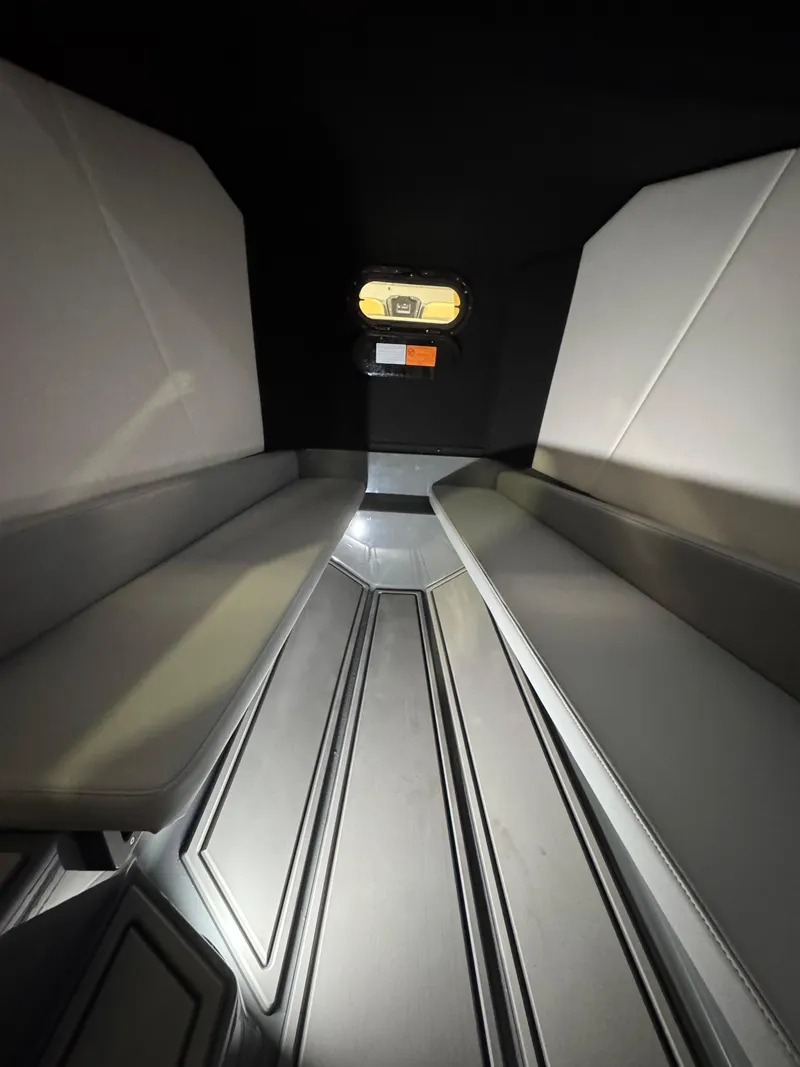 Slide: The Image of Interior cabin of 2025 Sunsation 32 CCX boat with sleek seating and modern design. - 15