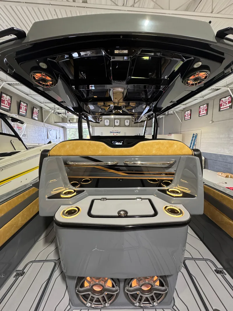 Slide: The Image of 2025 Sunsation 32 CCX boat interior with modern design and advanced audio system. - 17