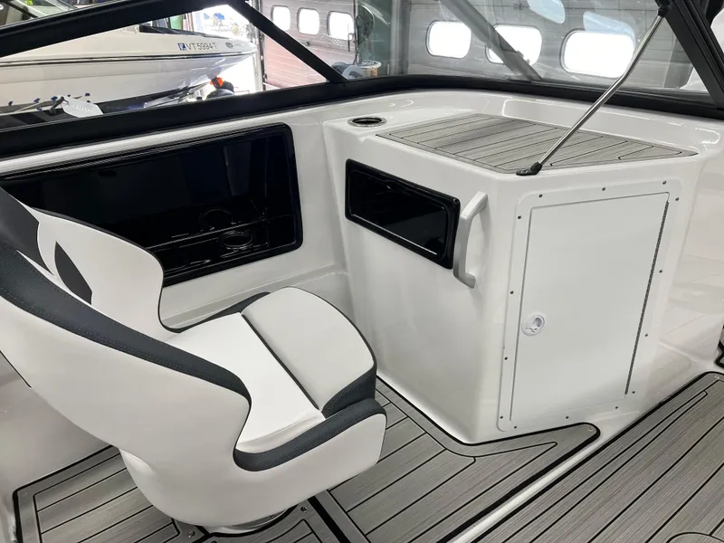 Slide: The Image of 2024 Yamaha Boats 195S interior seating with sleek design and comfortable upholstery. - 5
