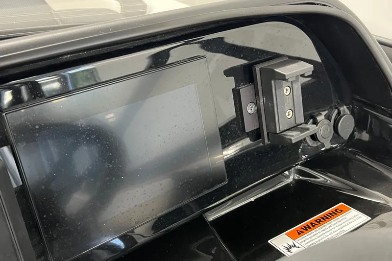 Slide: The Image of 2024 Yamaha Boats 195S dashboard with touchscreen and warning label. - 9