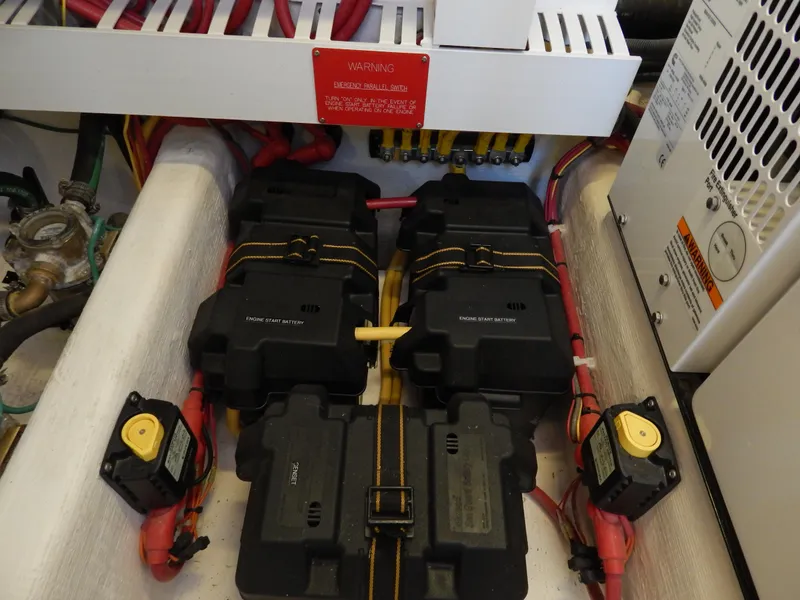 Slide: The Image of Engine compartment of 2010 Sabre 40 Sedan with batteries and wiring. - 47