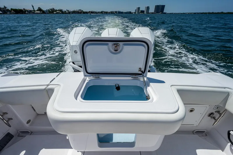 Slide: The Image of 2023 Jupiter 38 boat with open livewell, cruising on open water. - 27