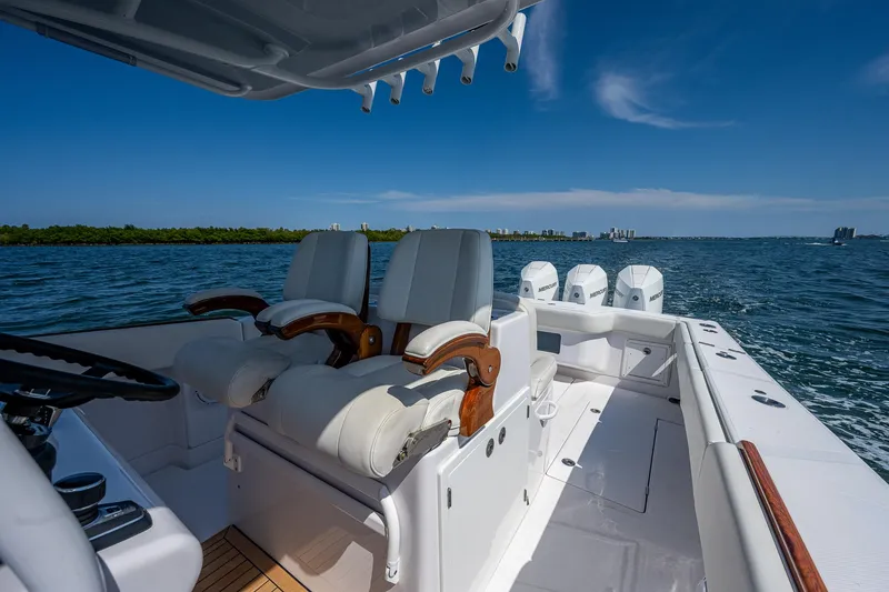 Slide: The Image of 2023 Jupiter 38 boat interior with luxurious seating and ocean view. - 44