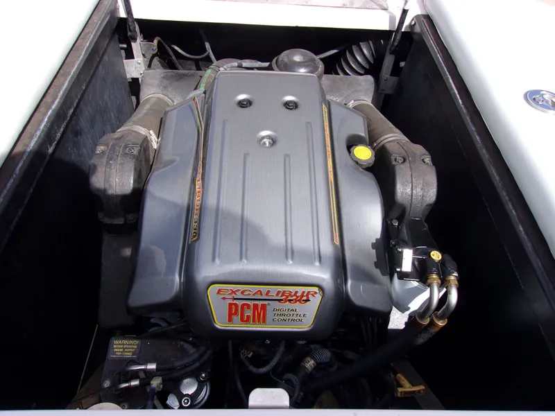 Slide: The Image of 2006 Correct Craft SUPER AIR NAUTIQUE 210 engine compartment with PCM Excalibur engine. - 14