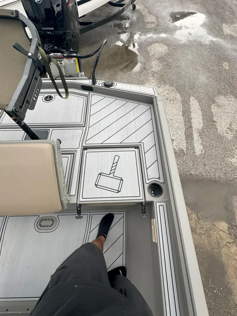 Slide: The Image of 2024 Thor 1900 Center Console boat interior with Mjolnir design on deck. - 16