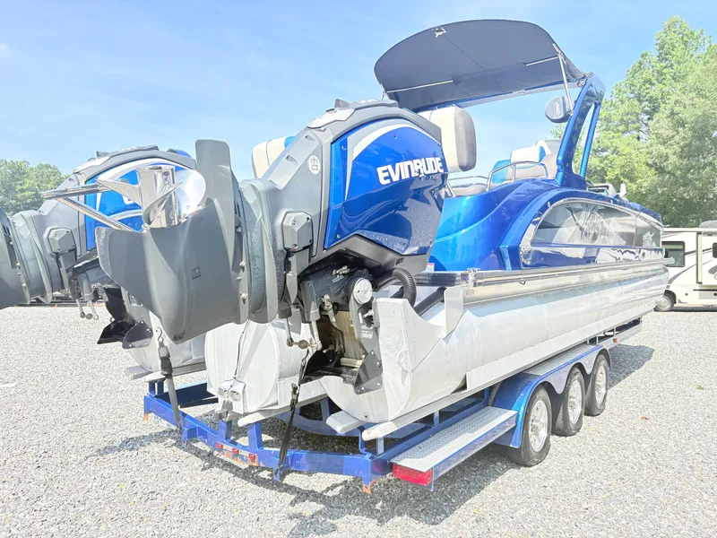 Slide: The Image of 2017 Manitou X-Plode Series 25 XT SRS SHP pontoon boat with Evinrude engines. - 5