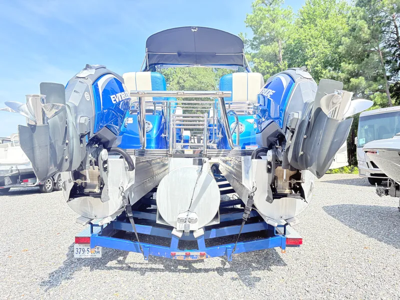 Slide: The Image of 2017 Manitou X-Plode Series 25 XT SRS SHP pontoon boat with dual Evinrude engines. - 6