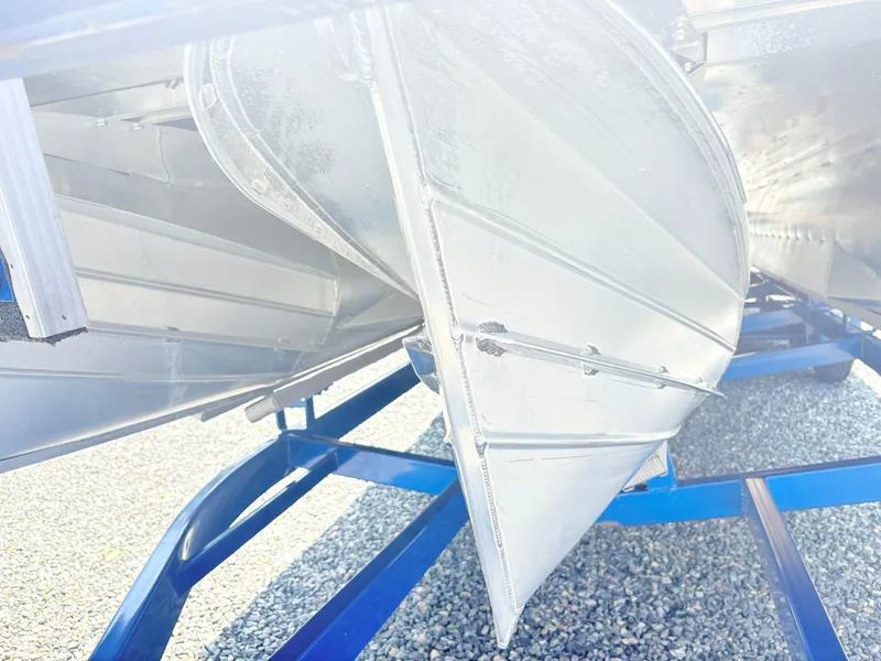 Slide: The Image of 2017 Manitou X-Plode Series 25 XT SRS SHP pontoon boat underside on trailer. - 8