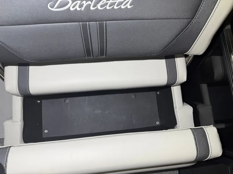 Slide: The Image of Close-up of a seat with Barletta logo and storage space underneath. - 14