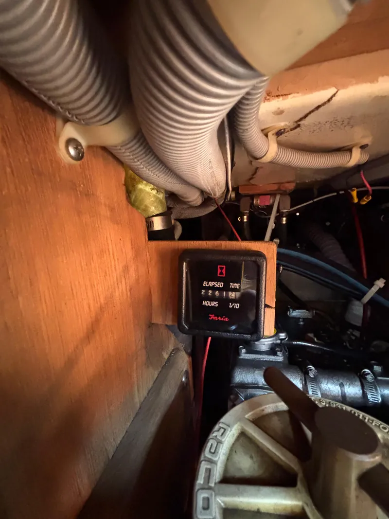 Slide: The Image of Engine compartment of a 1988 Bristol 33.3 with hour meter and wiring. - 27